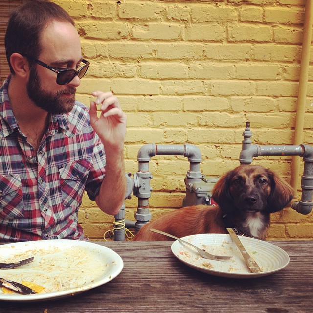 Tony Weinbender and his dog, Ollie, enjoying lunch together (photo: Elizabeth Morchel).